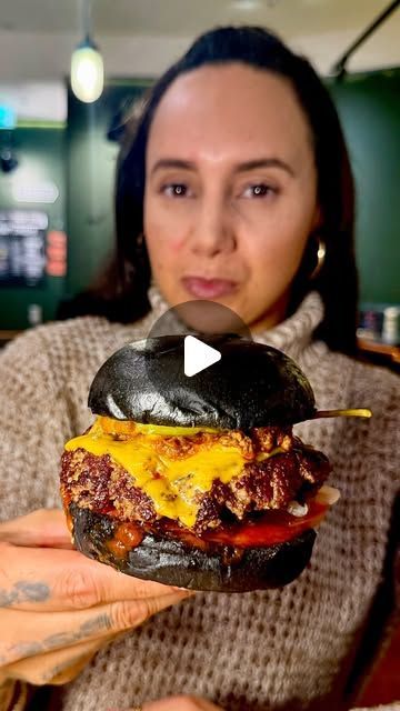 Chilli Con Carnage burger with a black bun at Honest Burgers, Cabot Circus
